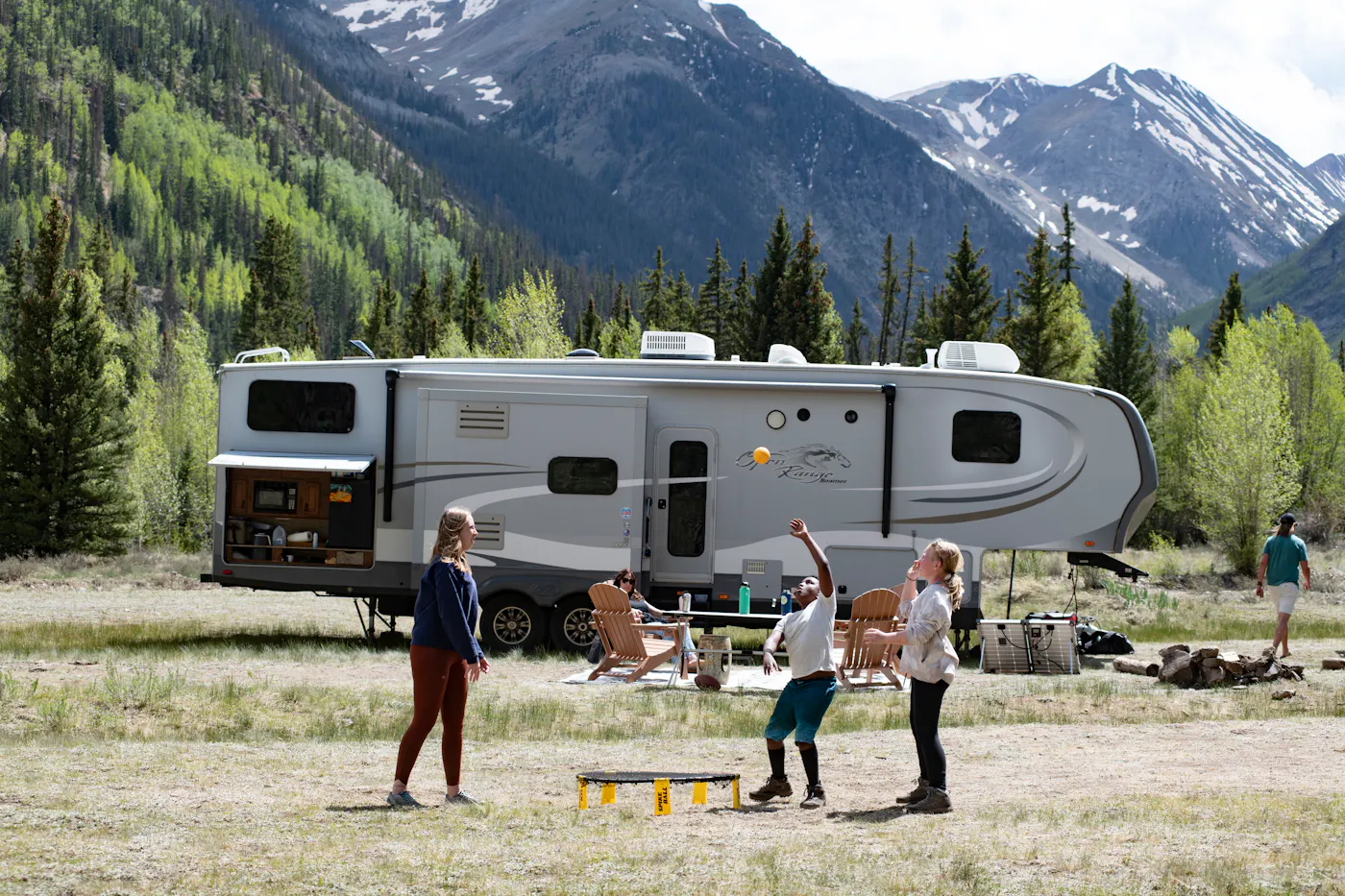 the Carew children playing a game in front of their RV