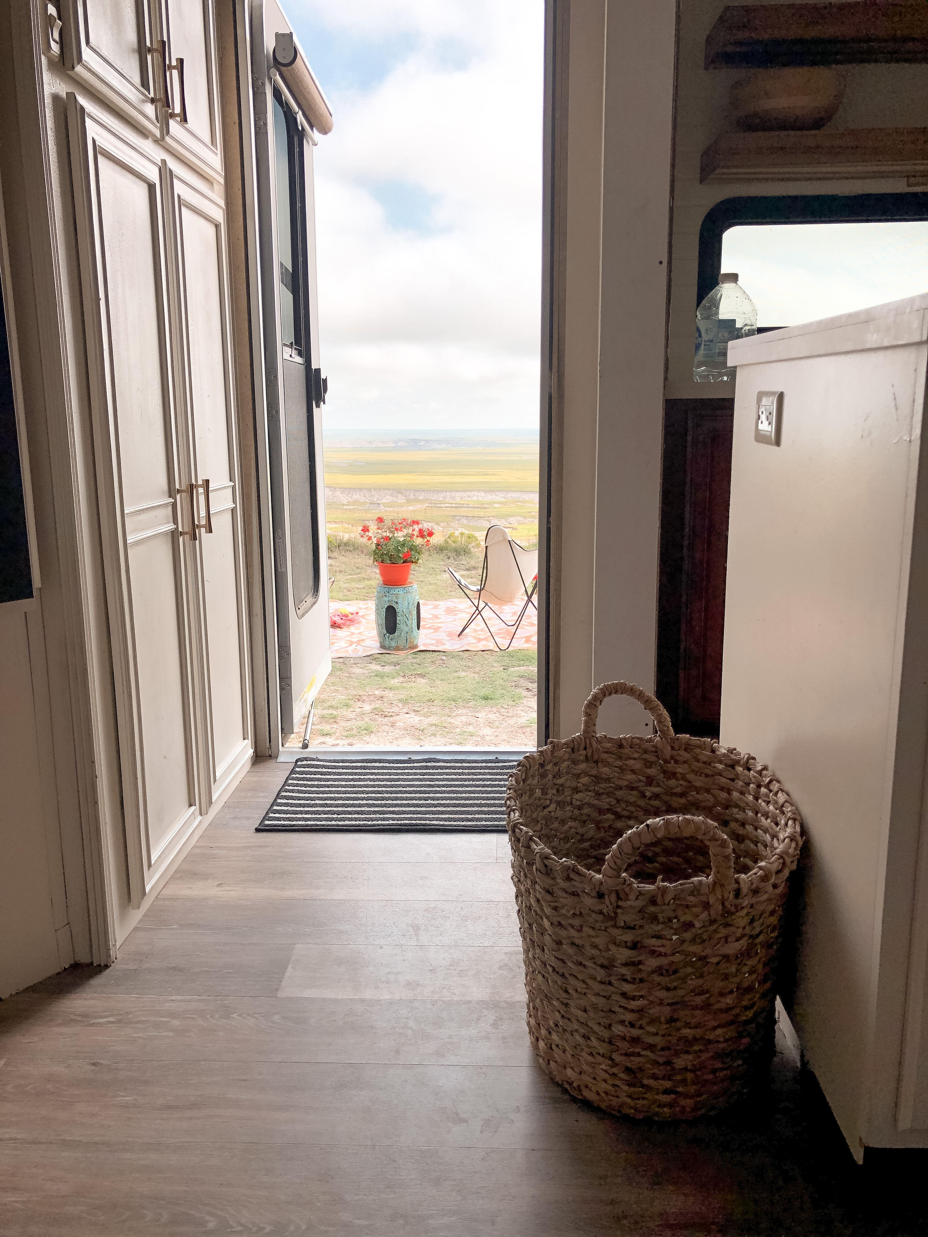 A view looking outside of Shannon Carew's door to her Highland Ridge RV.