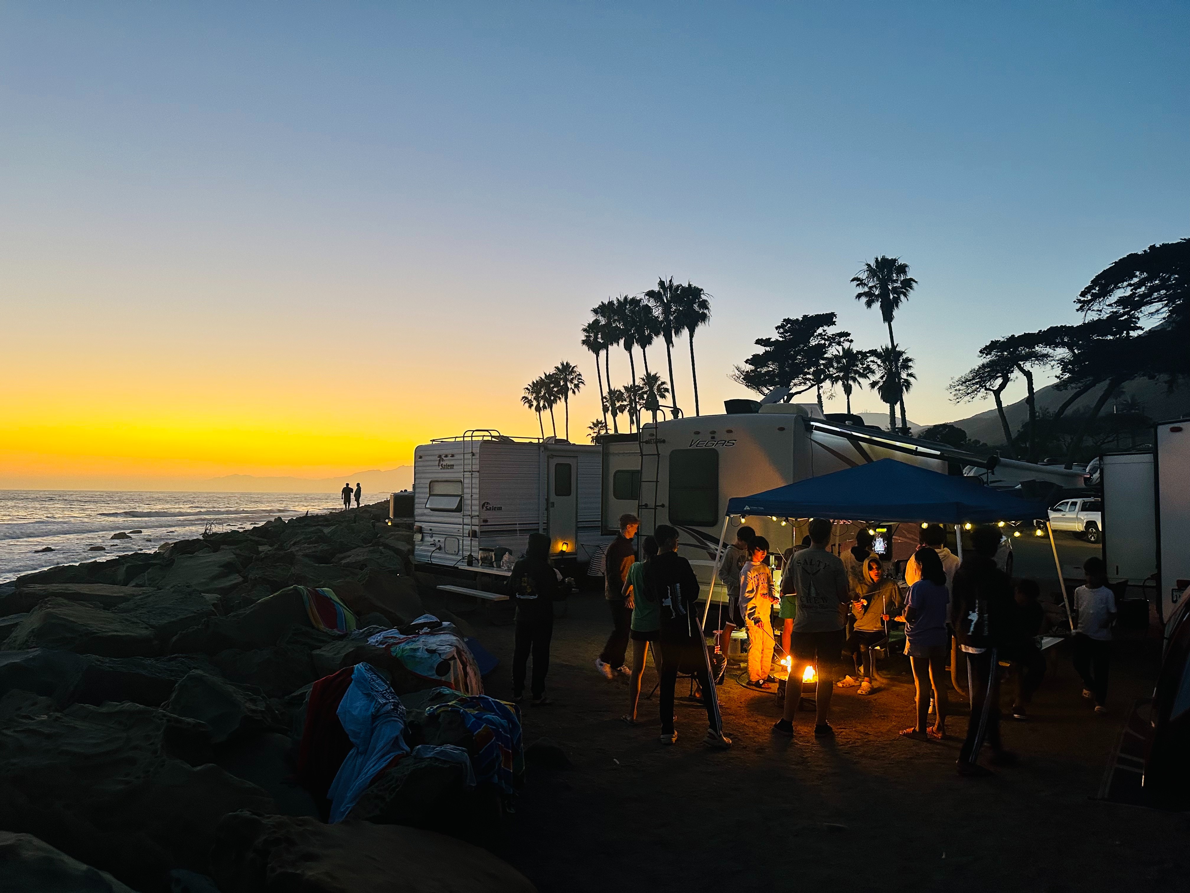 The Brenda Huynh and Tiger Doan family with friends camping at the beach with their Thor Motor Coach Vegas Class A motorhome