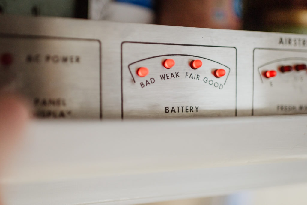 Red buttons lit up on RV battery meter