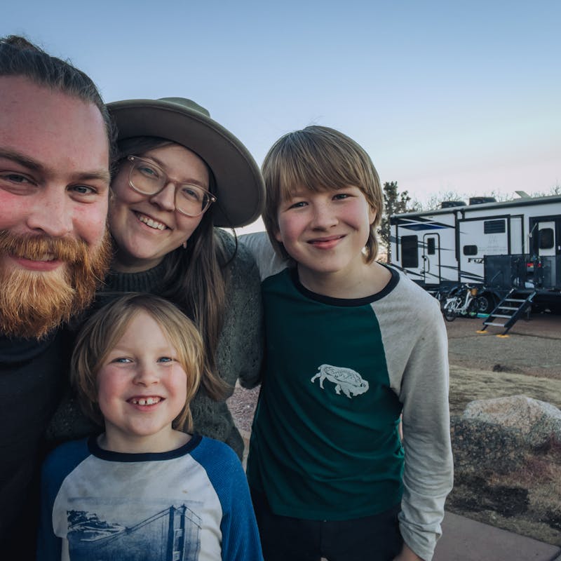 Kris & Andy Murphy's family take a selfie in front of their RV