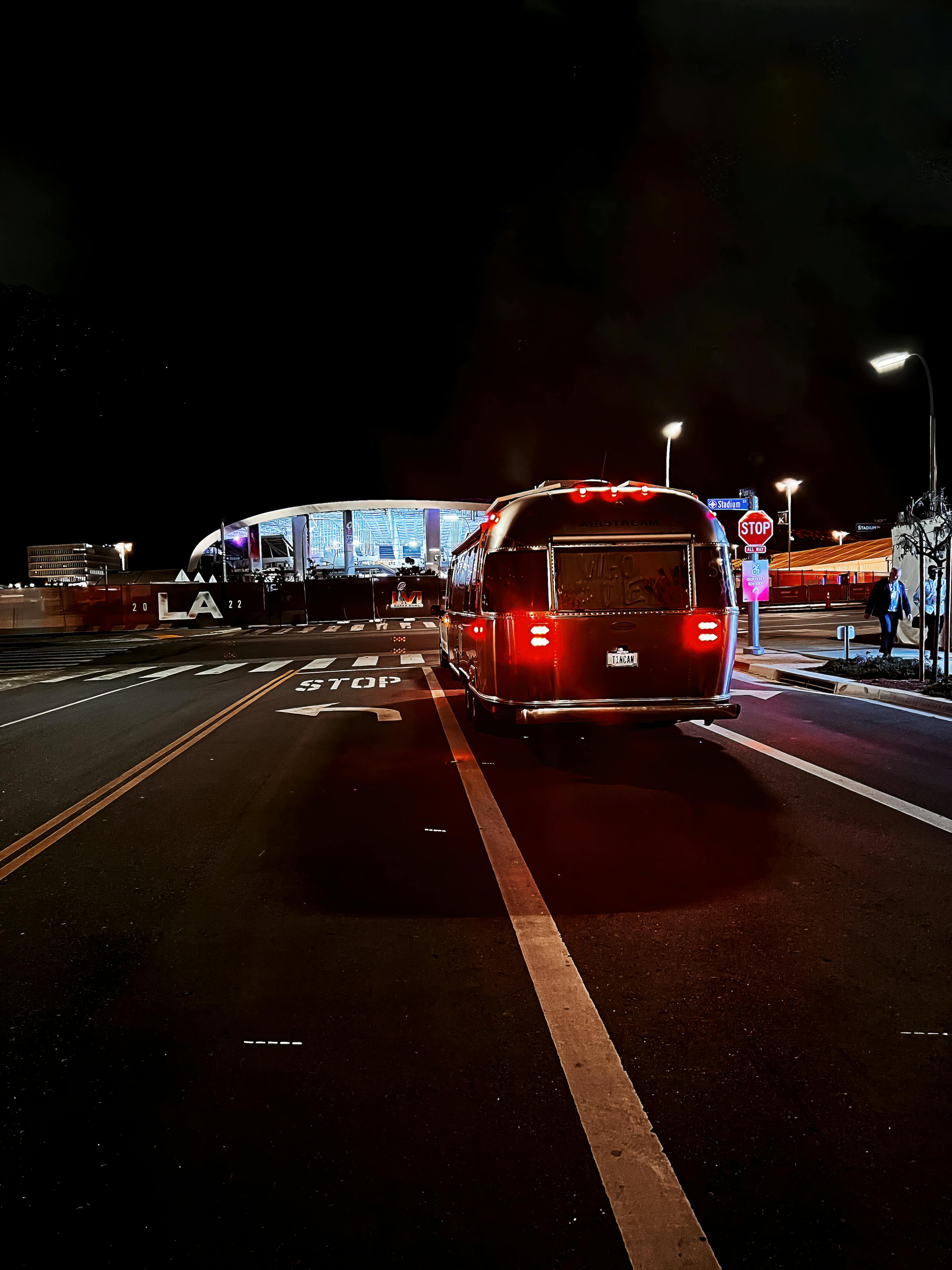 Stacey Power's Airstream parked at the Super Bowl Stadium at night