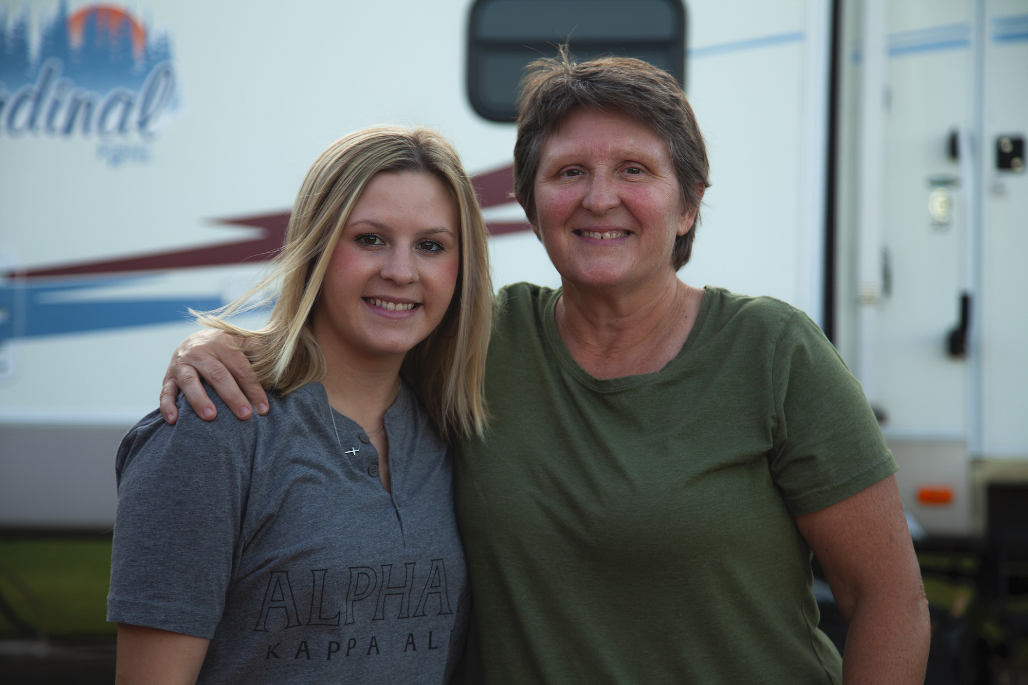 A mother and daughter posed for a portrait. 