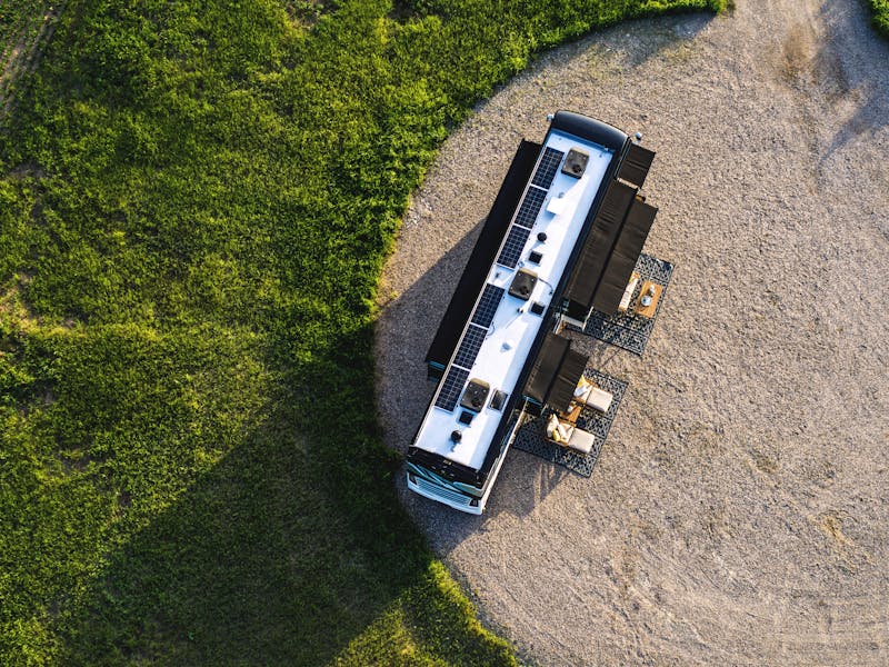 Solar panels and Starlink atop a Tiffin Class A Motorhome