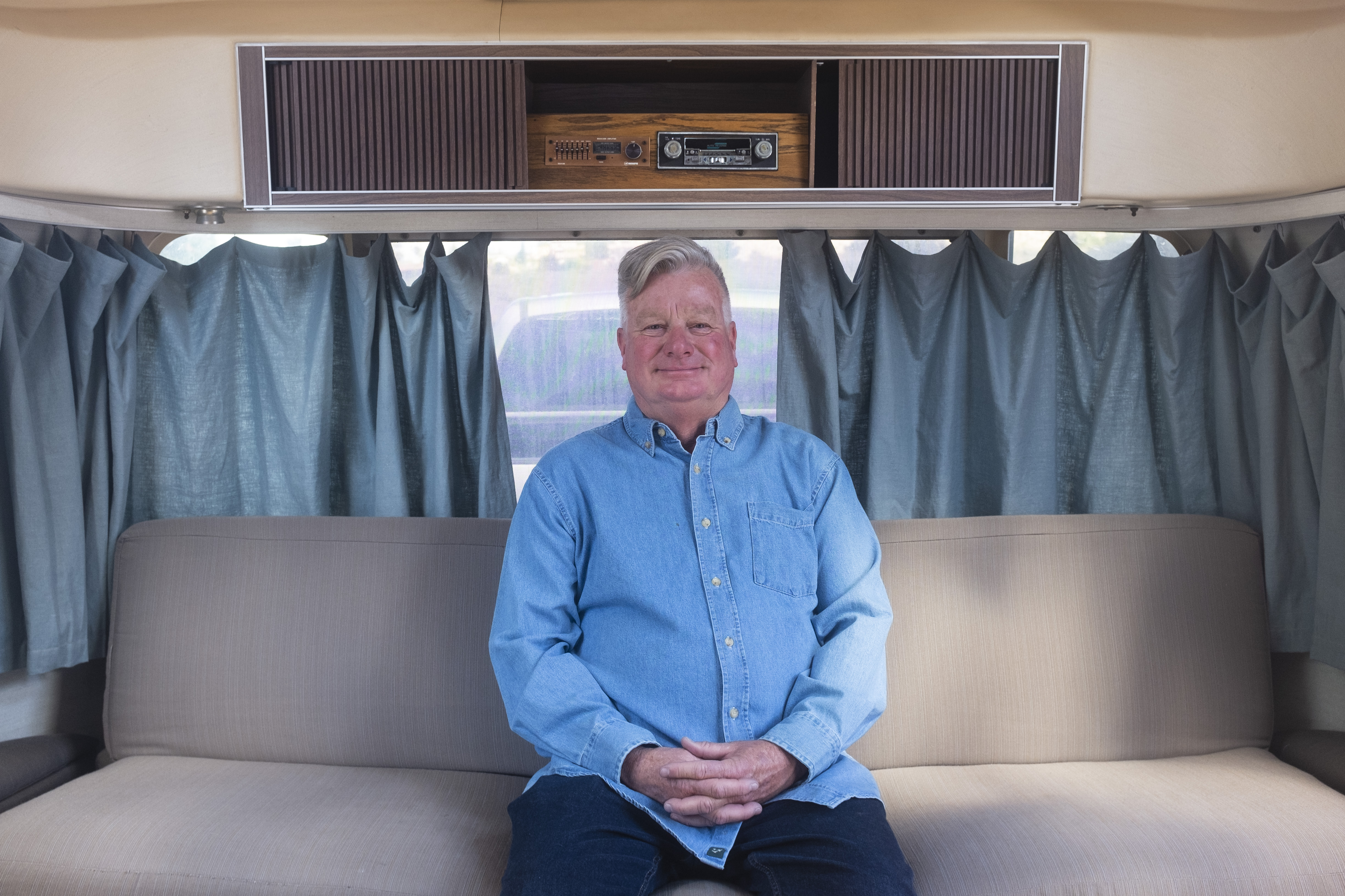 A headshot of Bill Hartig inside the family Airstream. 