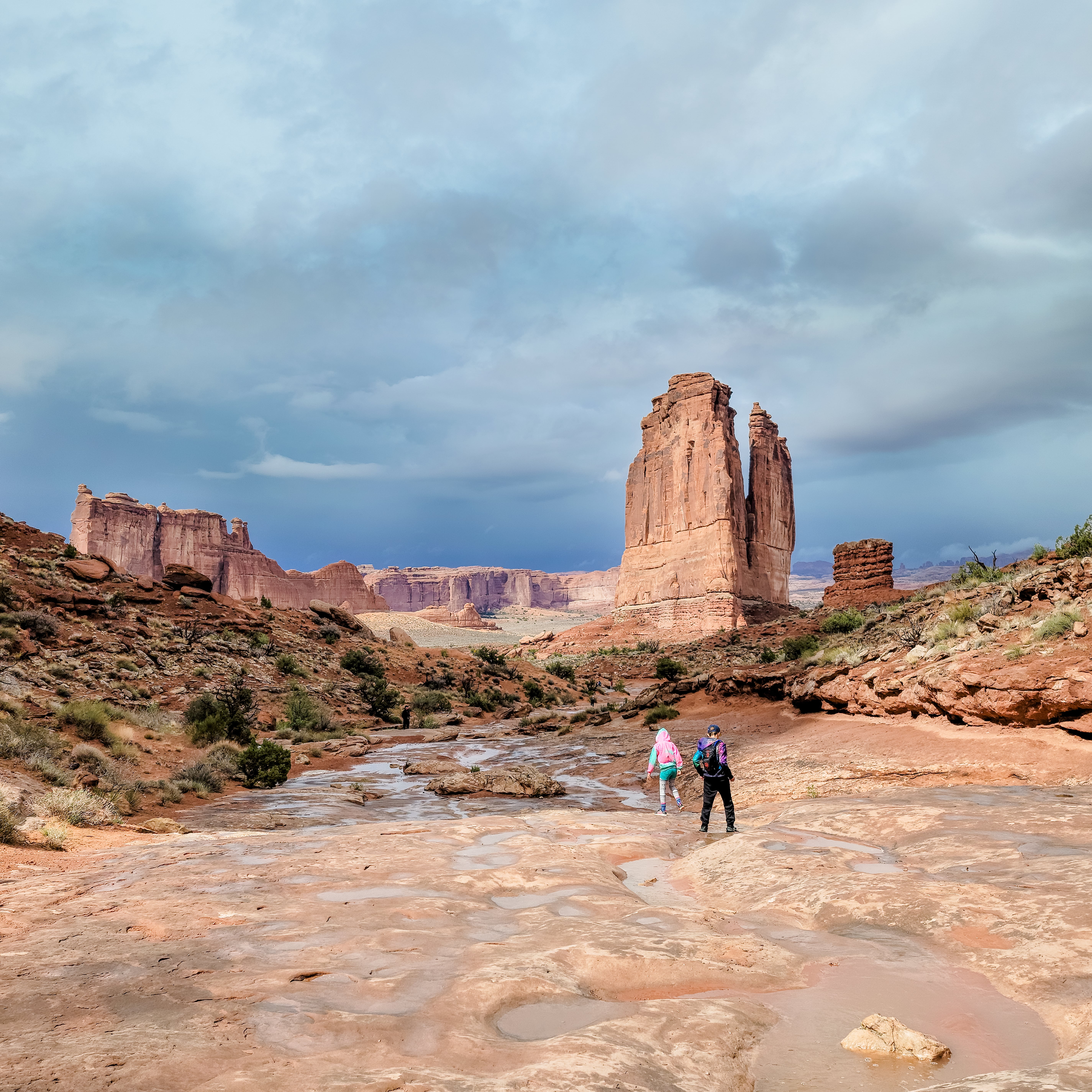 STEVE & KAYLEE TECHAU's children exploring a rocky landscape 