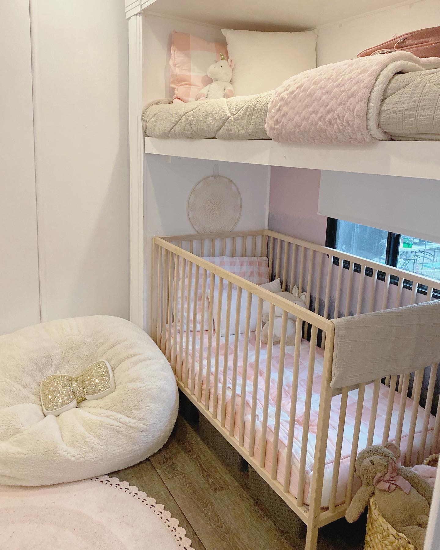 A kids' decorated bunk room inside an RV. 
