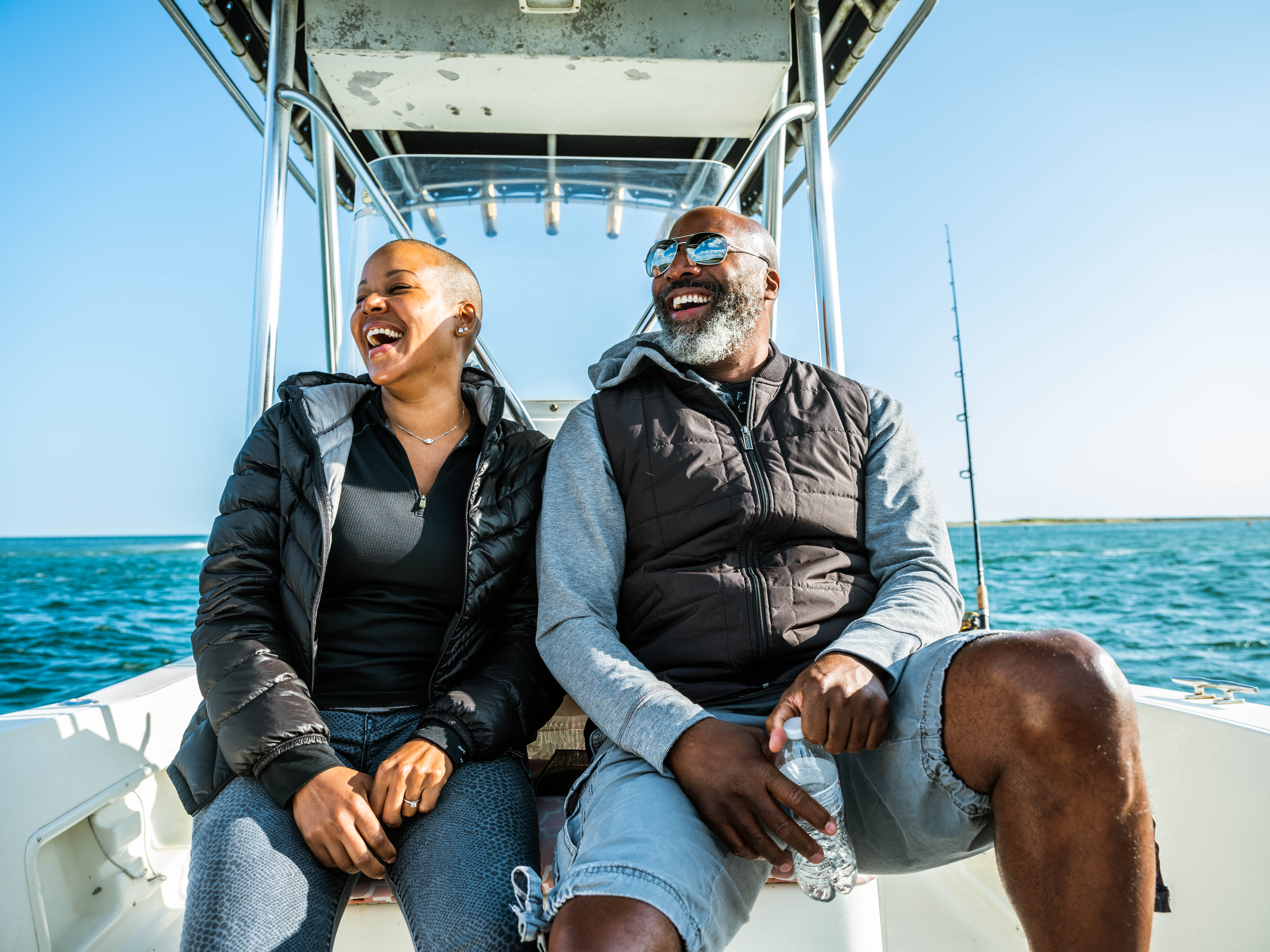 Sonya Lowery and Ray Young laugh while on a deep sea boating trip.