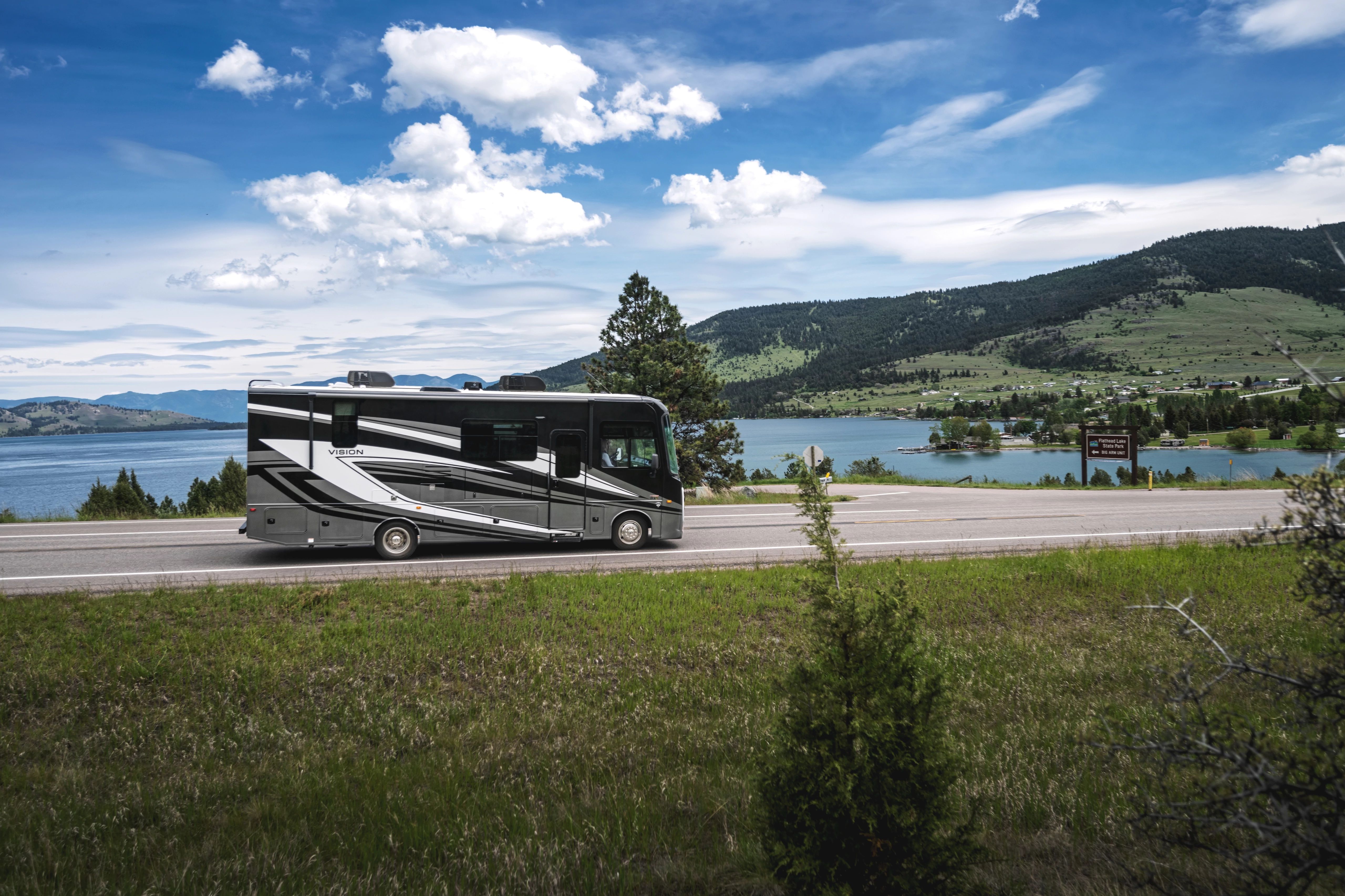 Jayco Entegra Vision Class A Motorhome driving down the road 