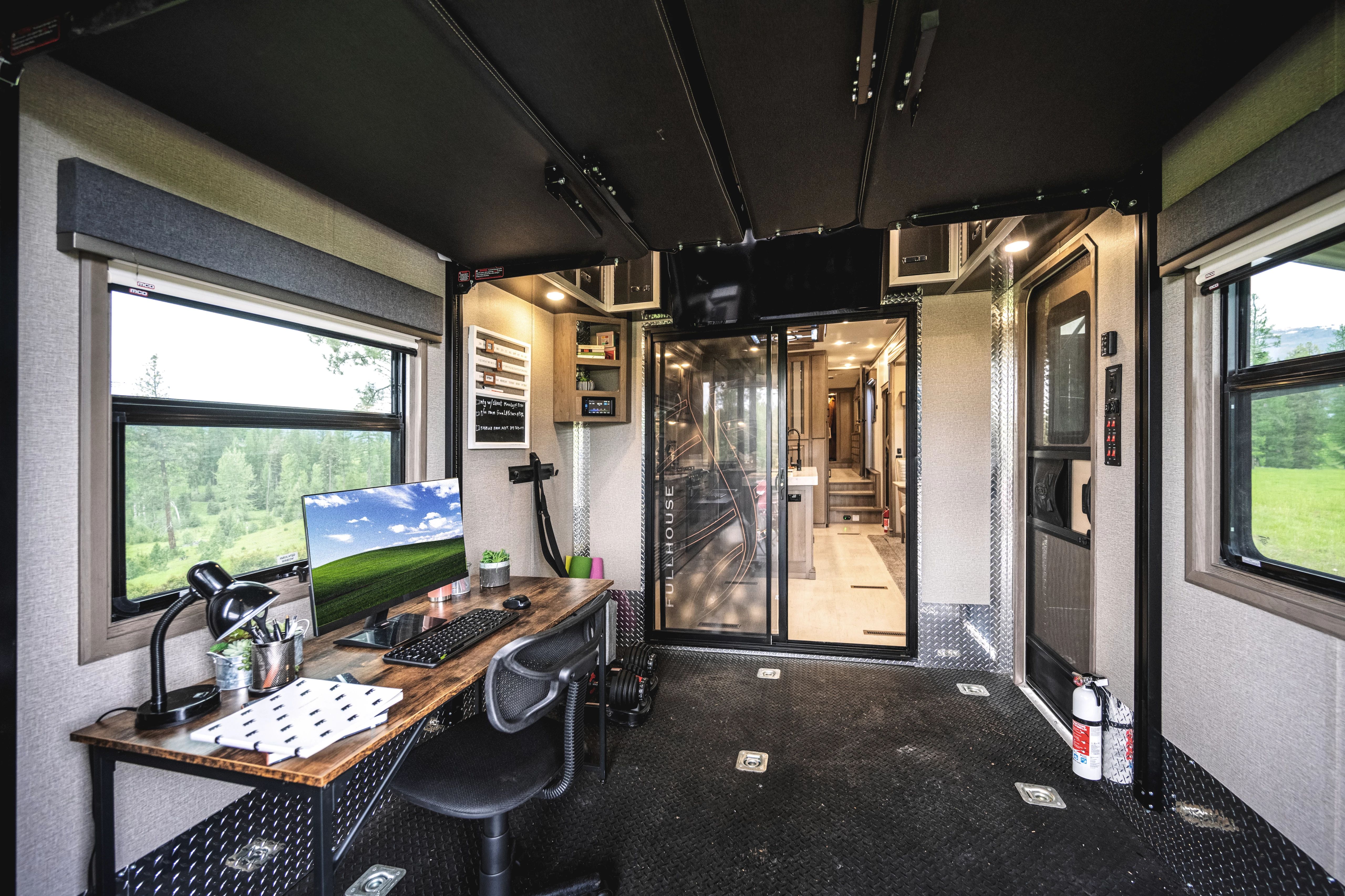 DRV Fullhouse Garage with a working space and exercise area 