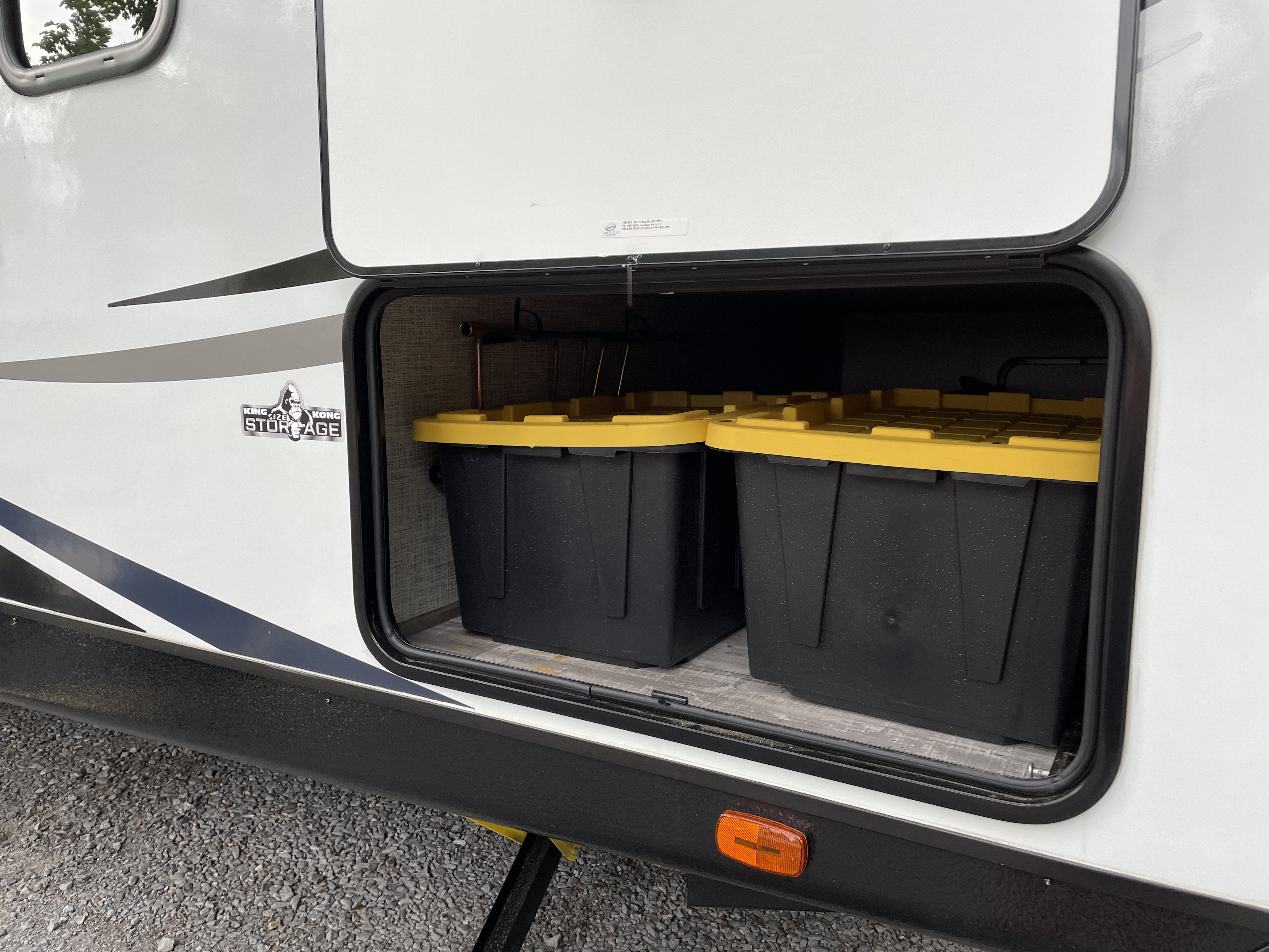 Stephanie Deininger's storage bins in the basement storage compartment of her RV
