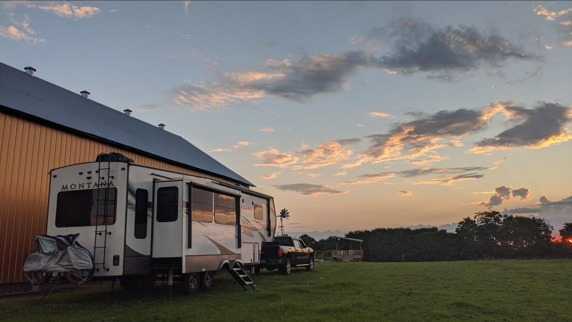 Mike and Brittany Ciepluch's Keystone Montana fifth parked at dusk.