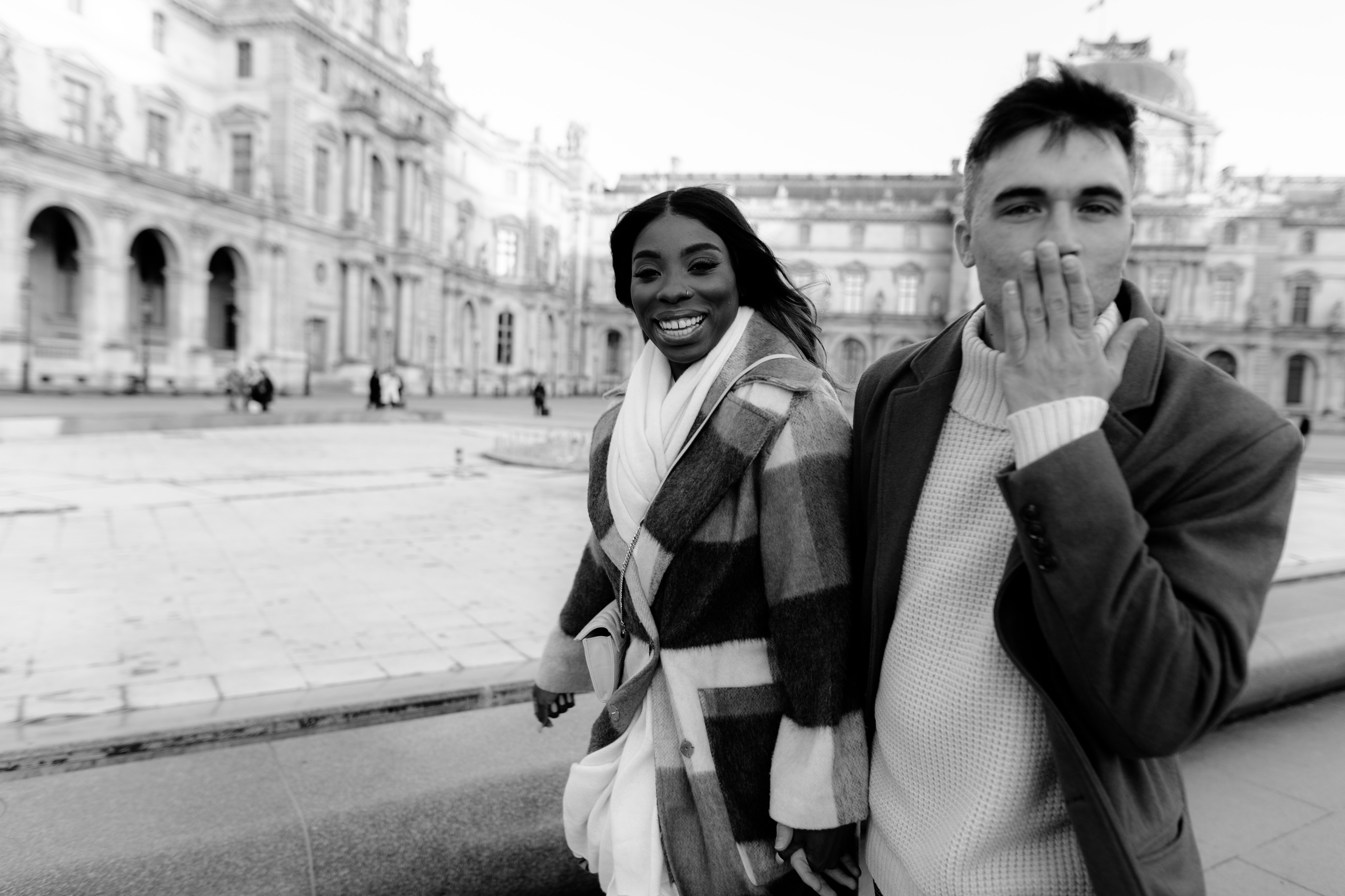 Jessy and Jim holding hands in Paris.