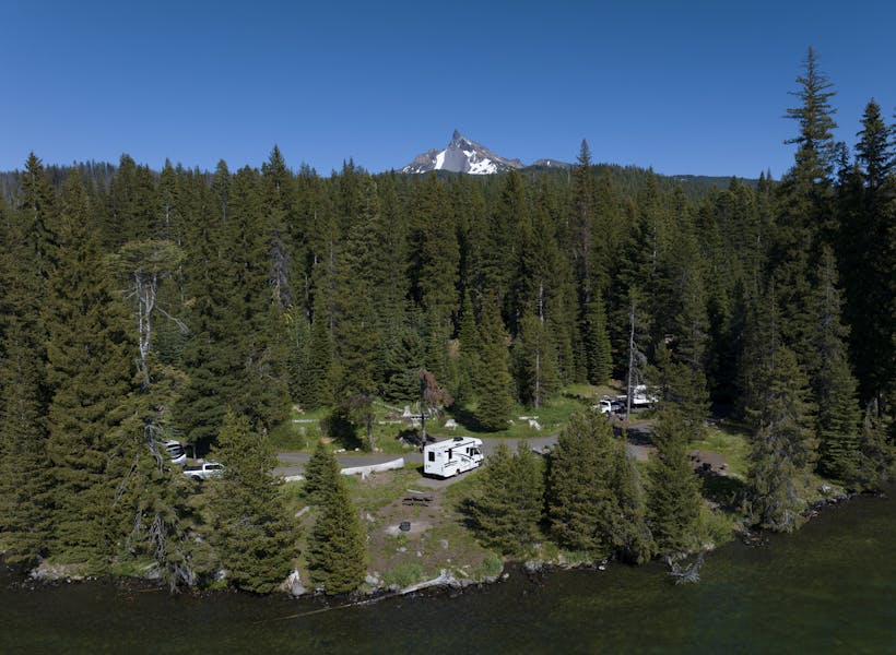 A Jayco Melbourne Class C motorhome at a campsite in Oregon.