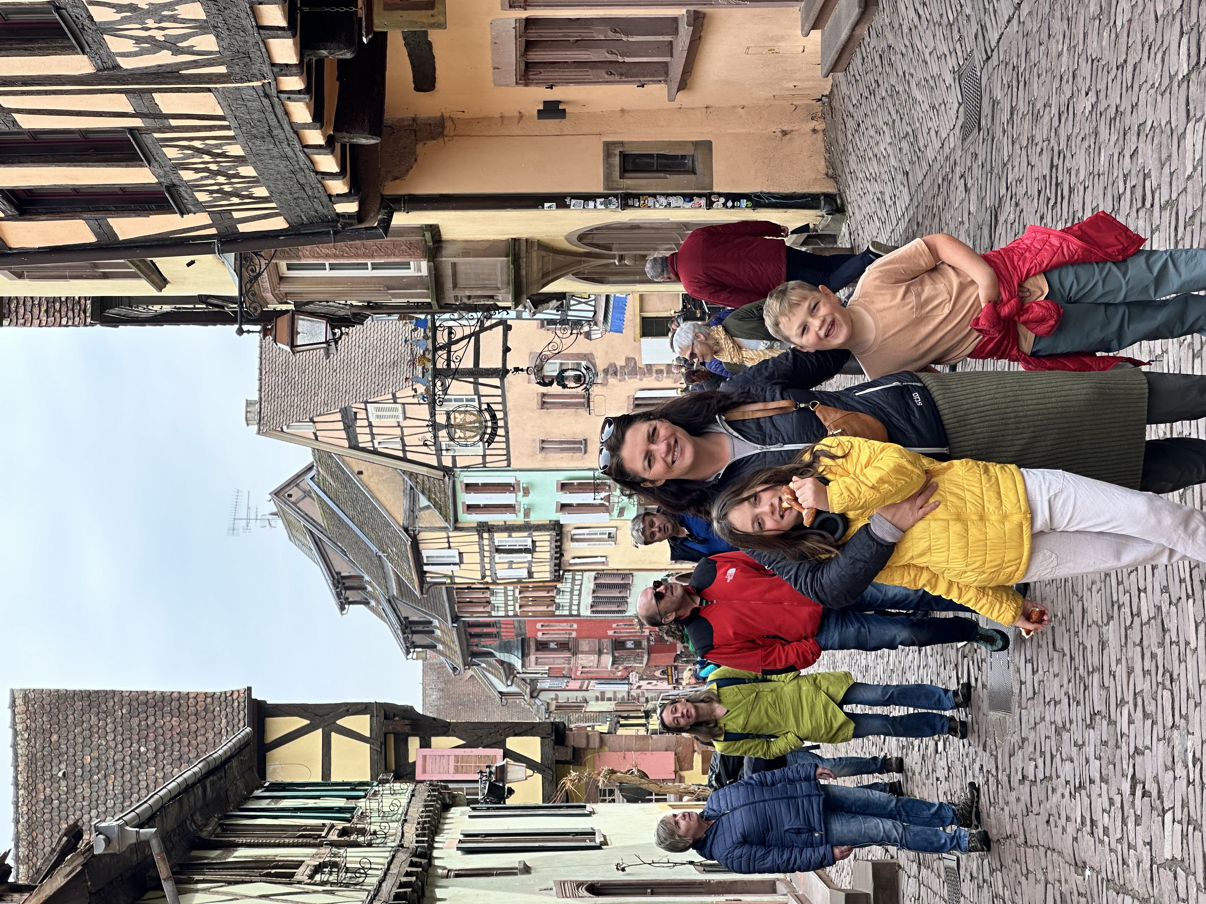 Melissa Lahr and her kids pose in another country.
