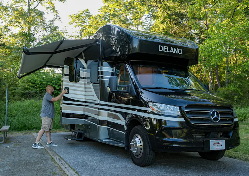 Gabe Rivero walks inside his Thor Motor Coach Delano.