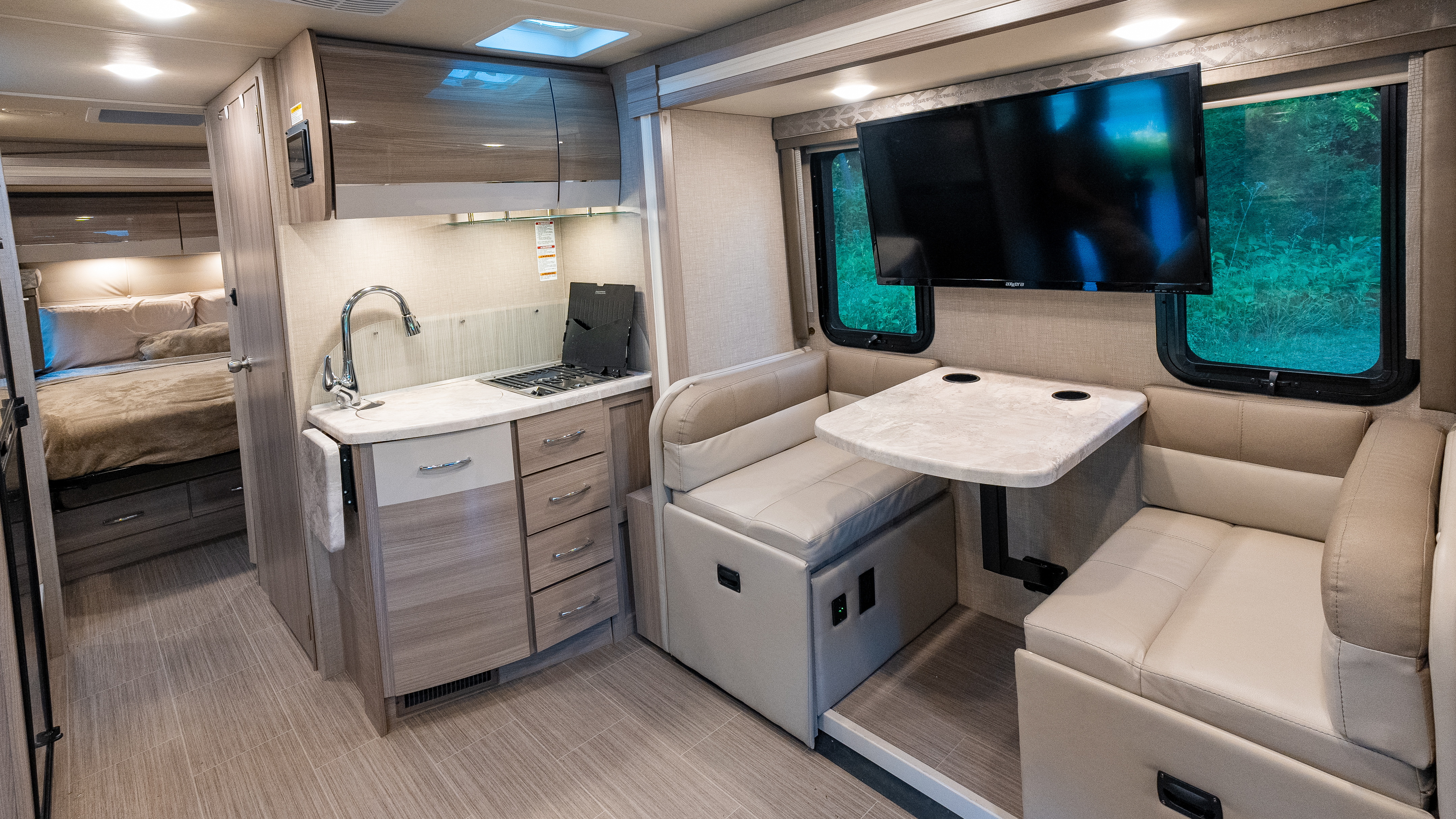 The kitchen and dinette inside Gabe and Rocio Rivero's Thor Motor Coach Delano.