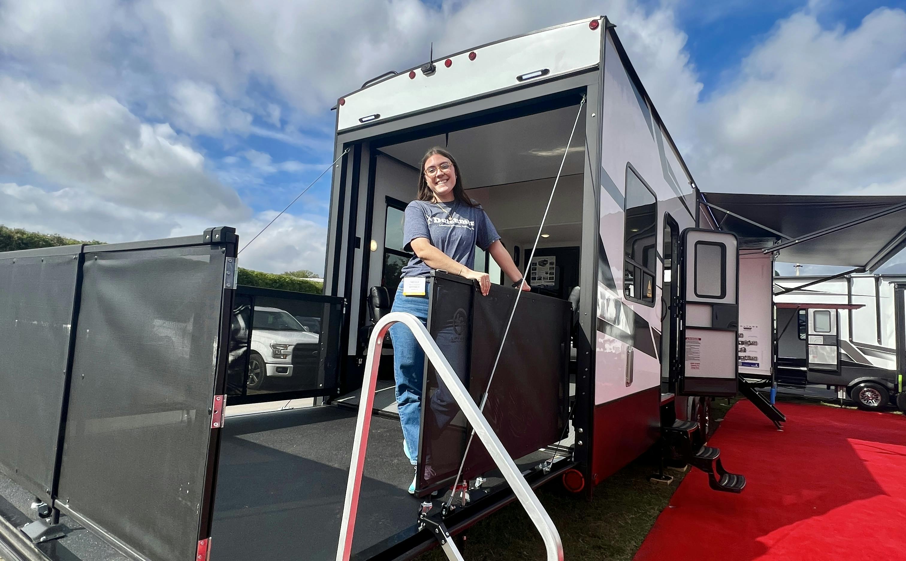 Nicole Damberg explores a Dutchmen Voltage Toy Hauler at the Florida RV SuperShow.