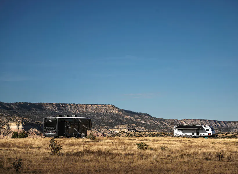 A Jayco Pinnacle fifth wheel boondocking in the desert.
