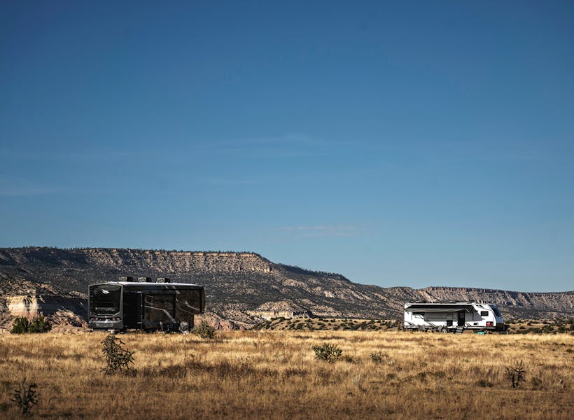 A Jayco Pinnacle fifth wheel boondocking in the desert.
