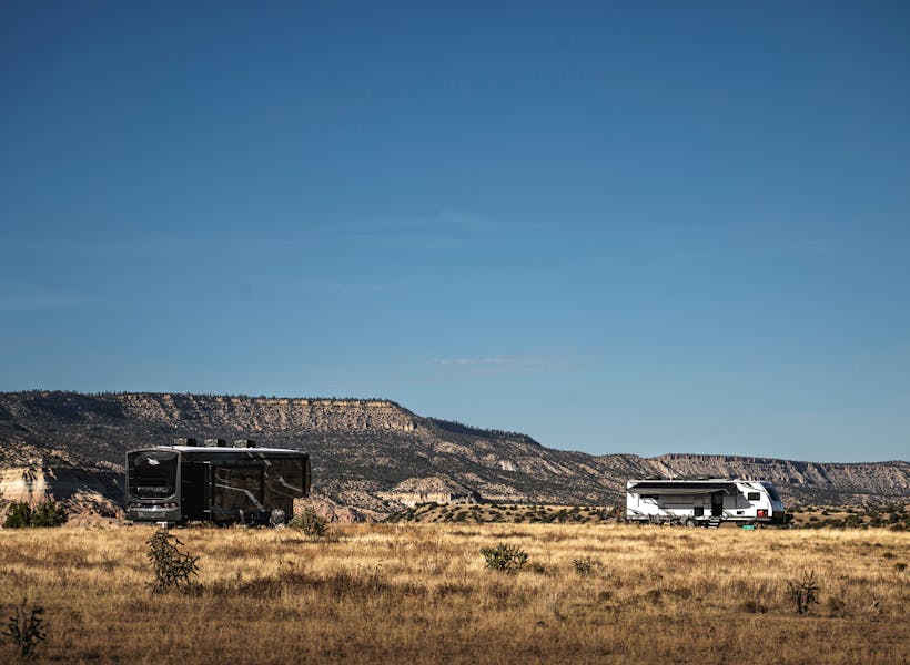 A Jayco Pinnacle fifth wheel boondocking in the desert.