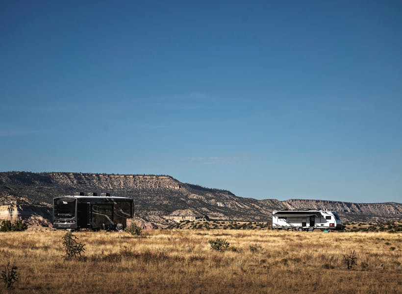 A Jayco Pinnacle fifth wheel boondocking in the desert.