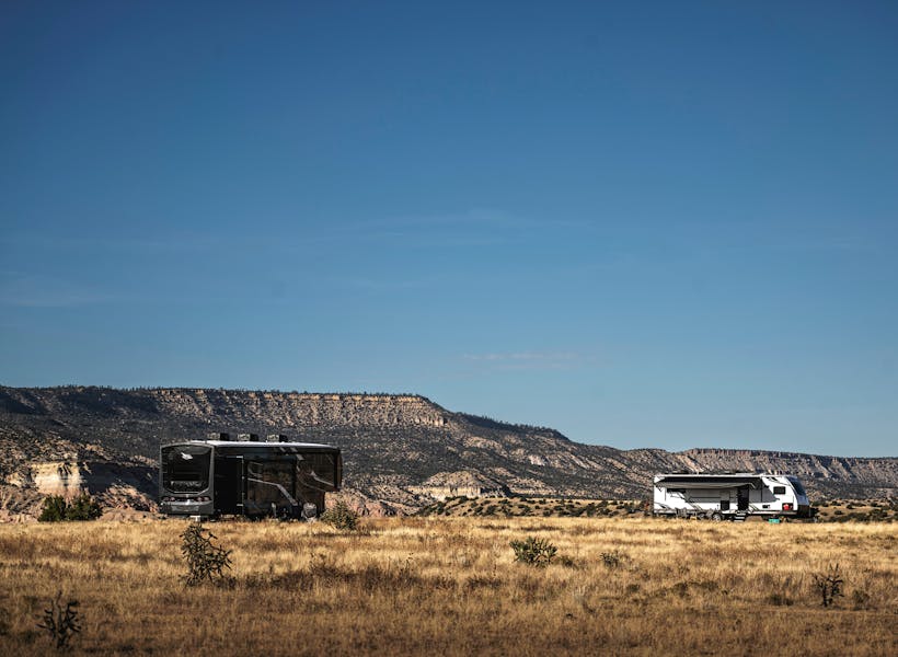 A Jayco Pinnacle fifth wheel boondocking in the desert.
