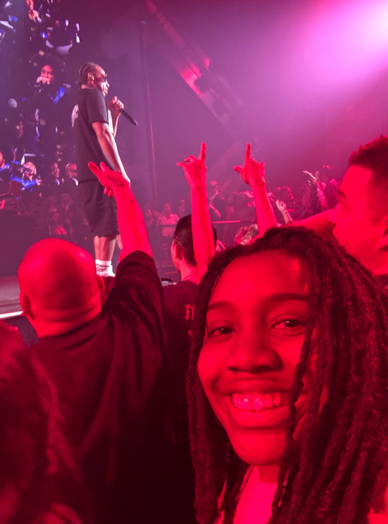 Sherise Gumbs stands in the crowd at a Ludacris concert.