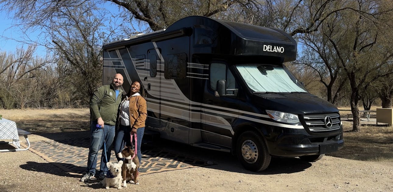 Gabe and Rocio Rivero in front of their Thor Motor Coach Delano.