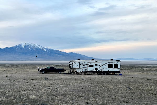 Melissa and Lucas Lahr's Heartland Torque toy hauler parked in the desert.
