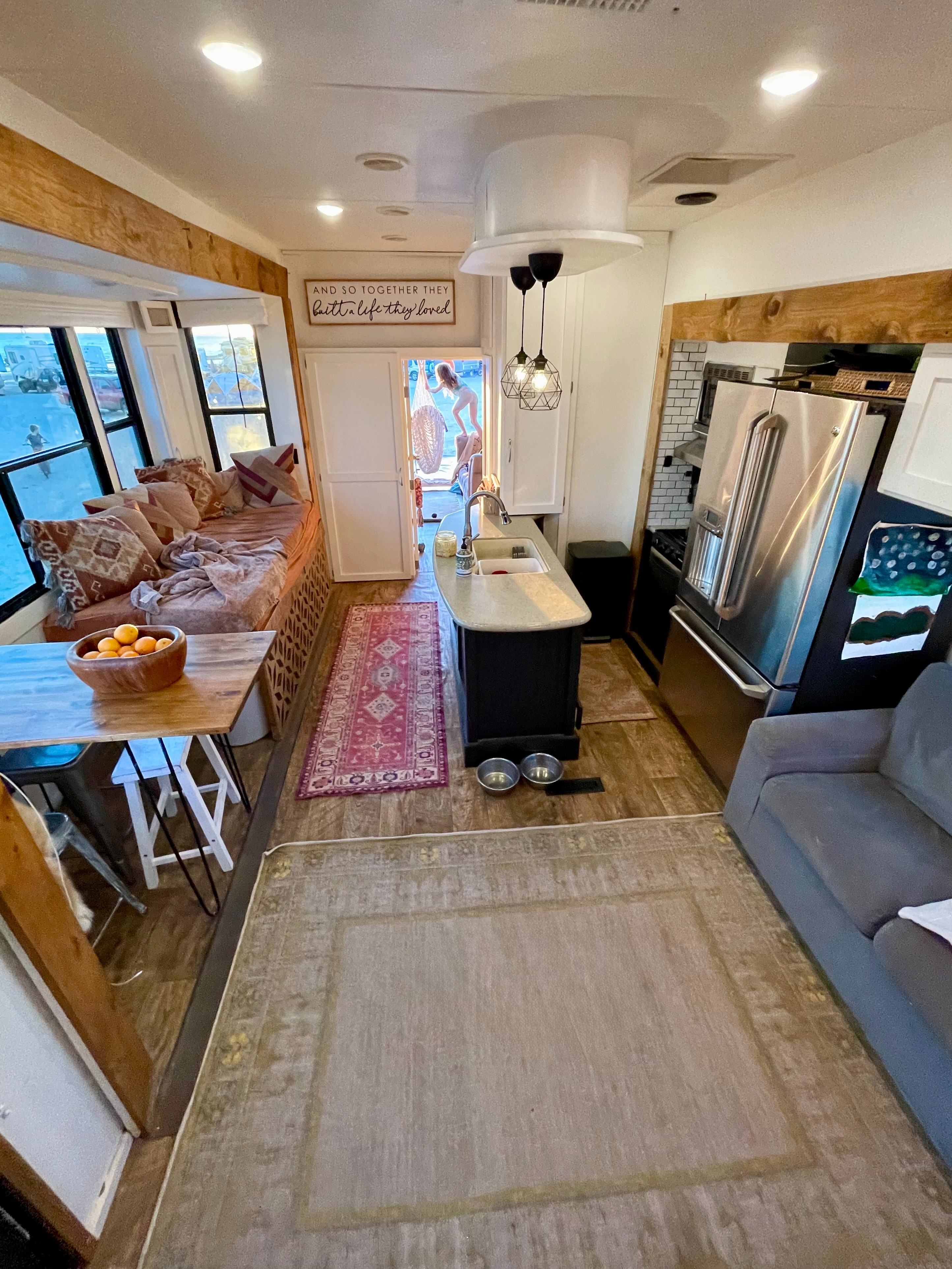 The living and kitchen area inside the Lahr's Heartland Torque toy hauler.