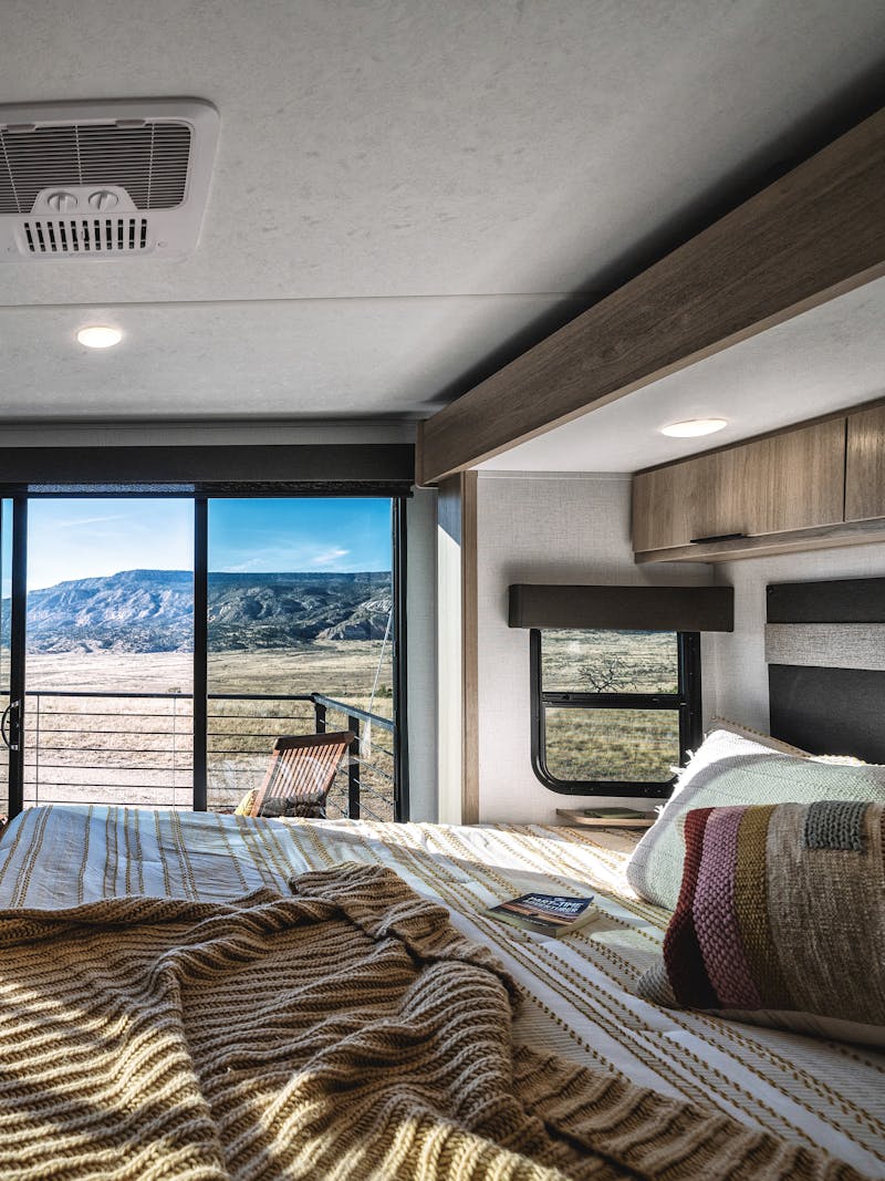 The master bedroom inside a Dutchmen Kodiak travel trailer.