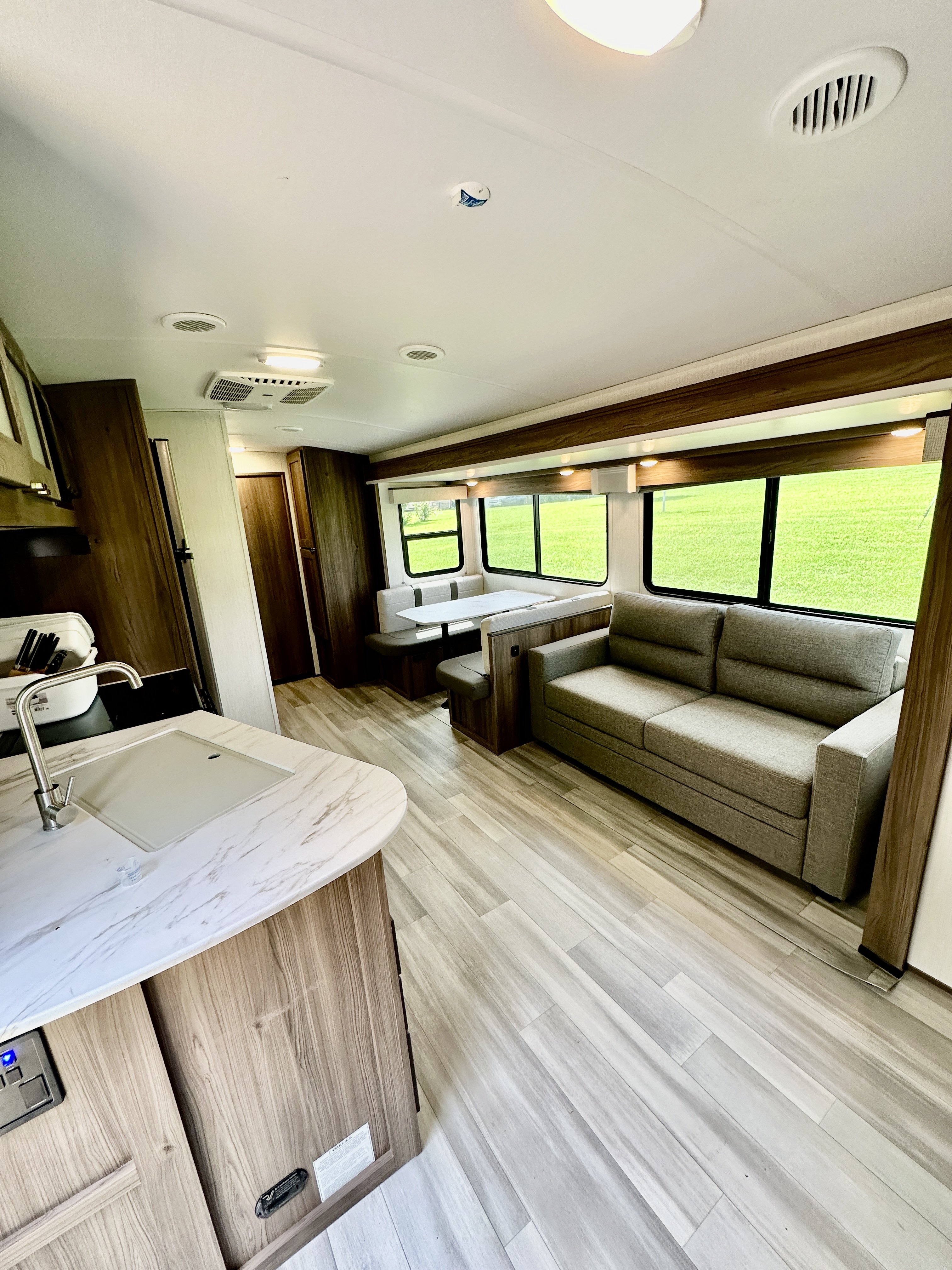 The living area inside John King's Cruiser MPG travel trailer.