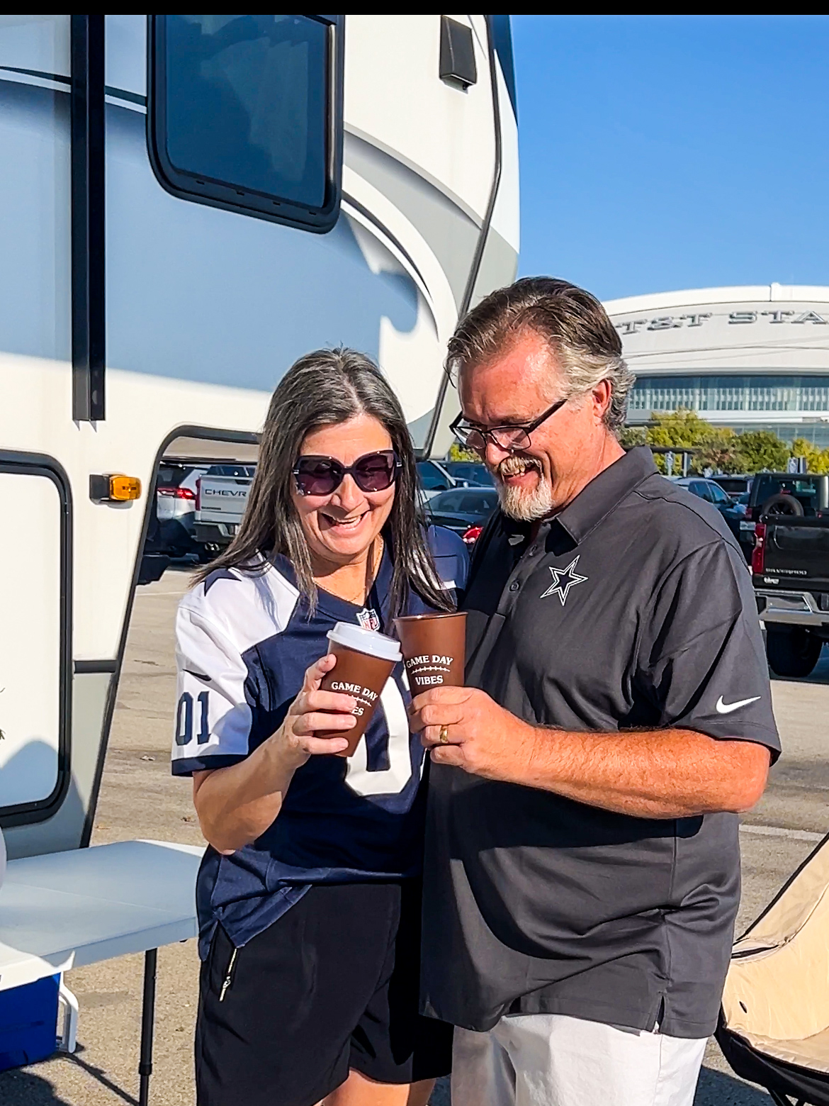 Donny and Tammy Benedict tailgating with their RV.