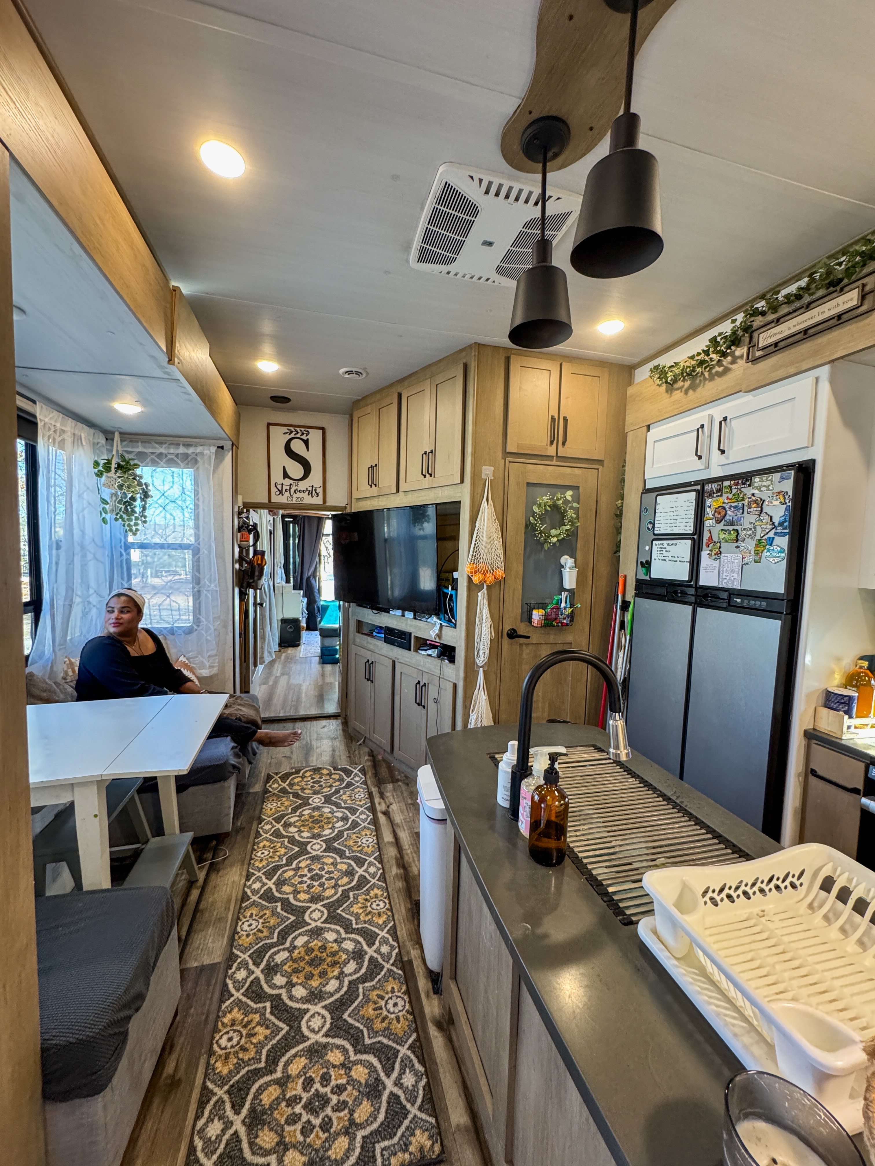 The living and dining area inside Josh and Keren Stolvoort's Keystone Carbon toy hauler.