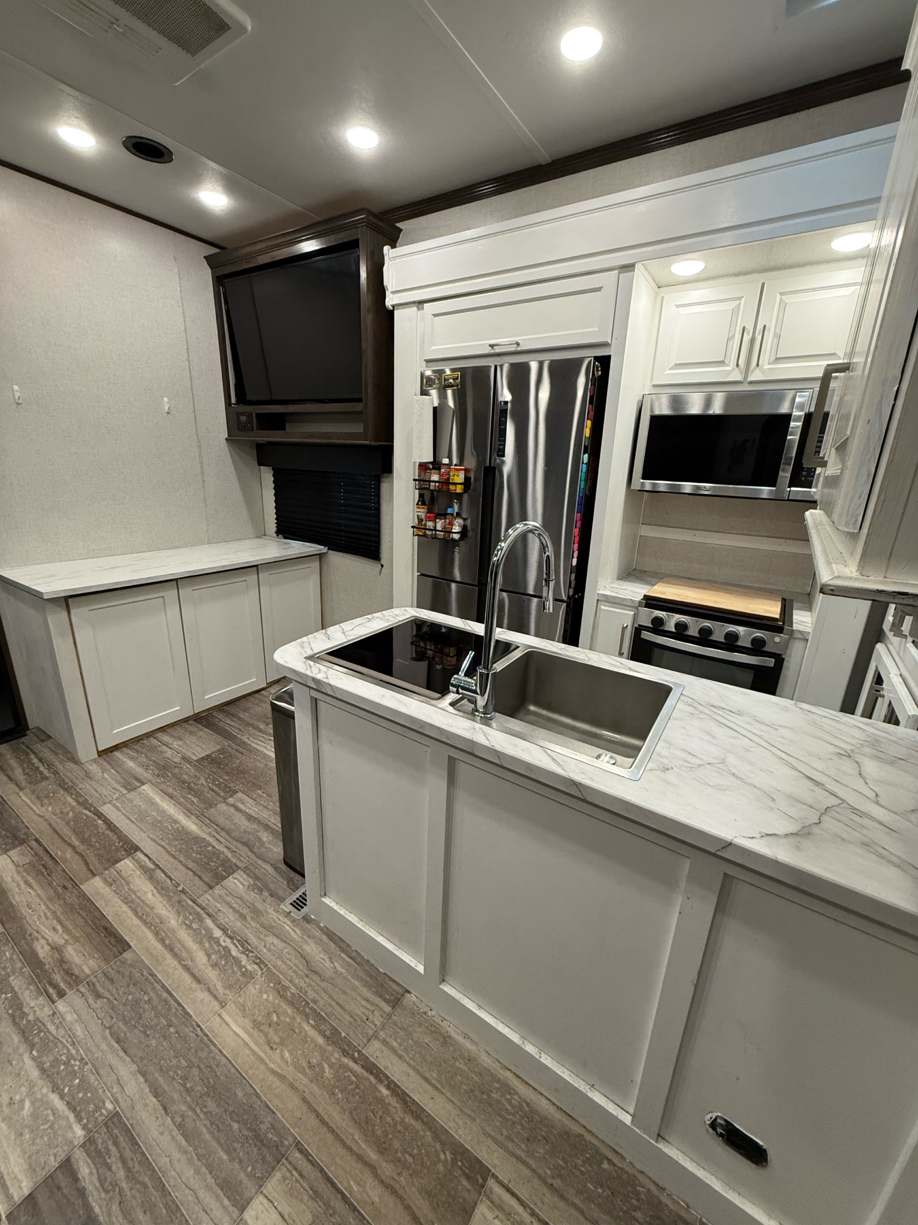 The kitchen countertop inside Jessica and Zach White's Dutchmen Voltage Triton toy hauler.