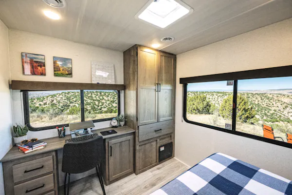 The desk setup inside the Keystone Springdale travel trailer.