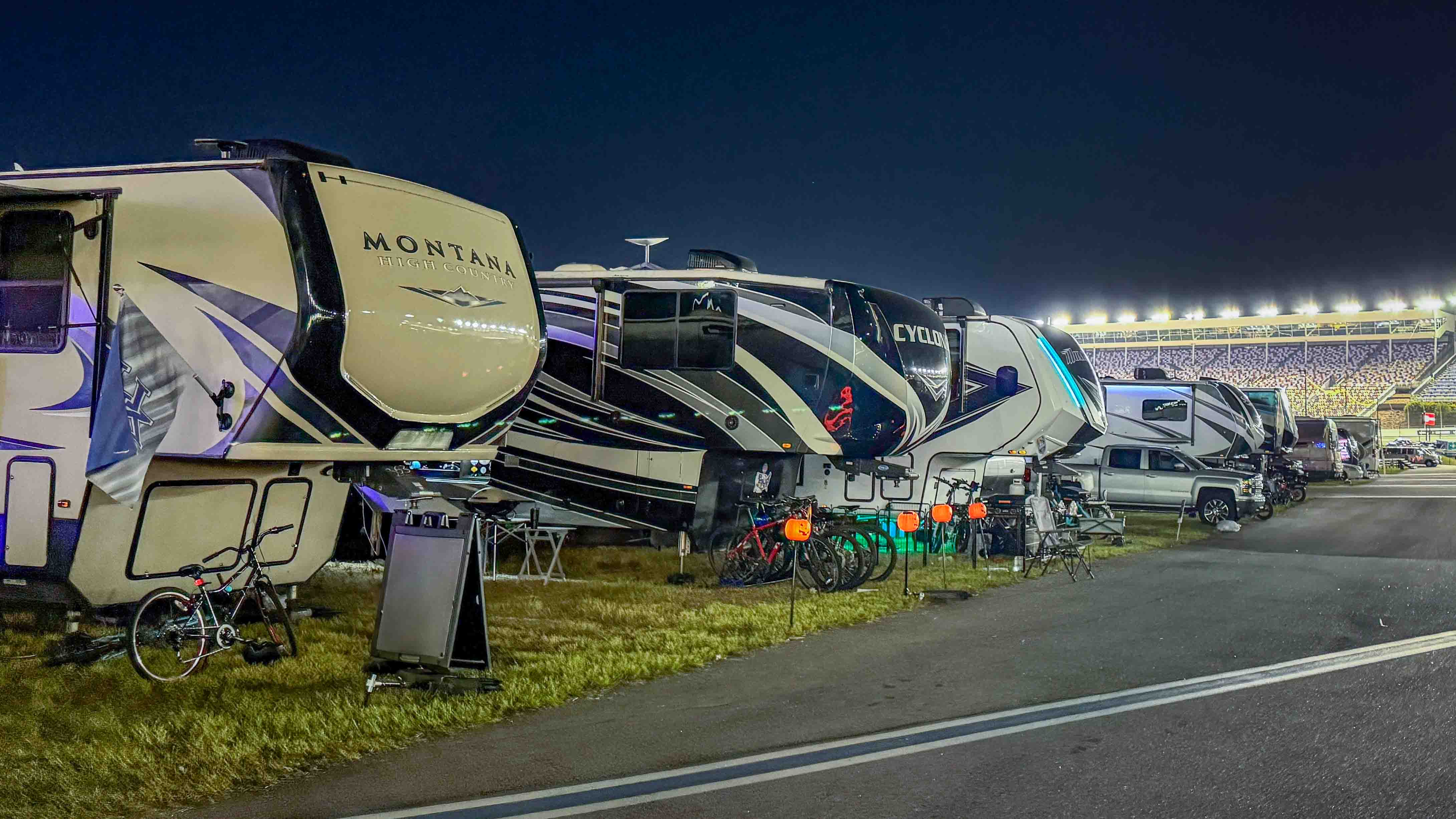 A row of RVs at the NASCAR race.