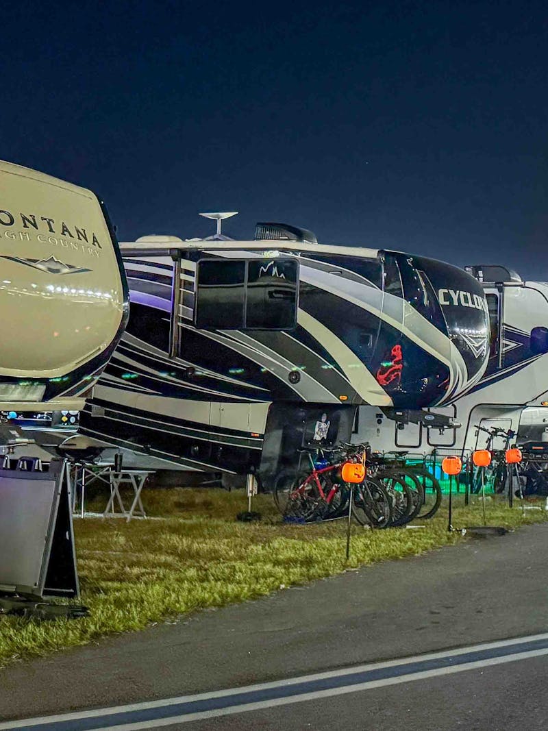 A row of RVs at the NASCAR race.