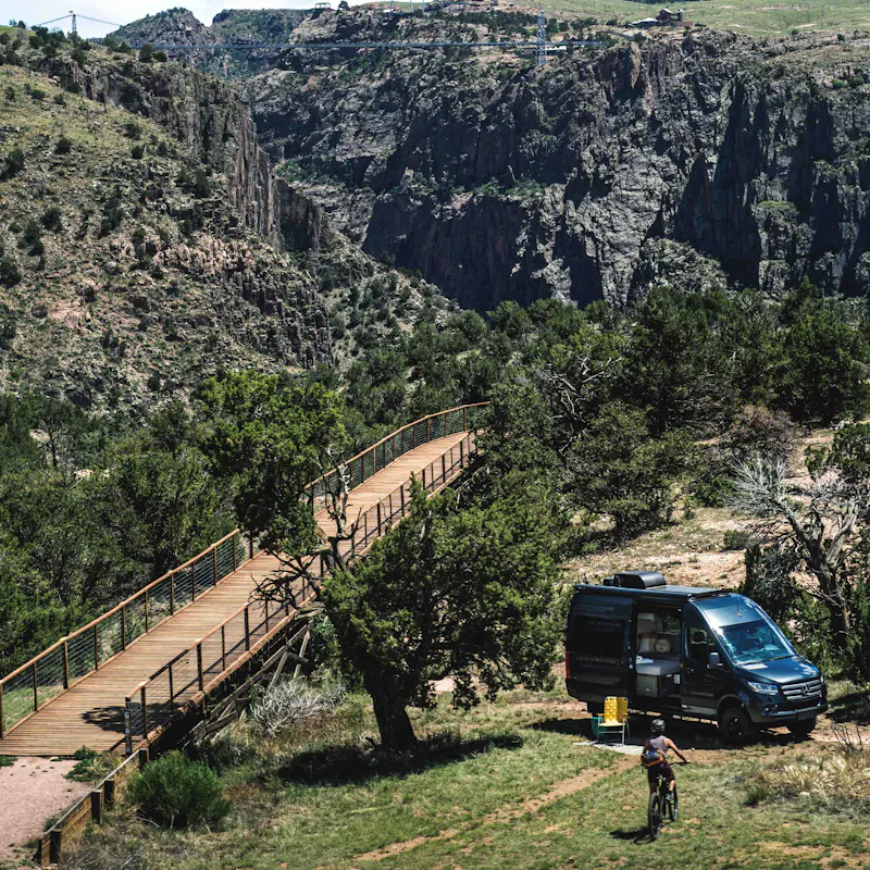 A Thor Motor Coach Tranquility camper van at a boondocking site.