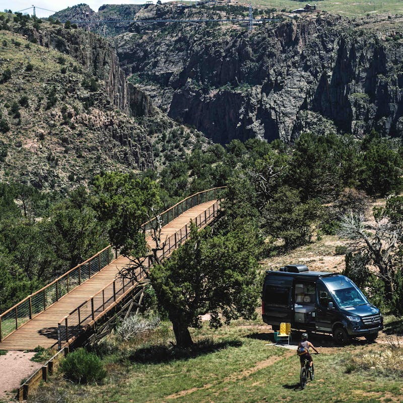 A Thor Motor Coach Tranquility camper van at a boondocking site.