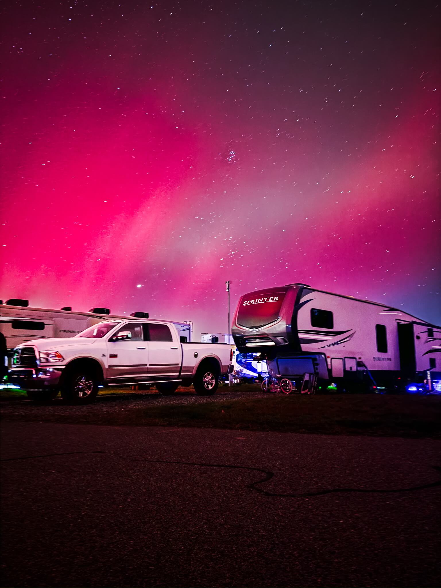 A starry night sky over Lia and Trevor Eyre's Keystone Sprinter fifth wheel.
