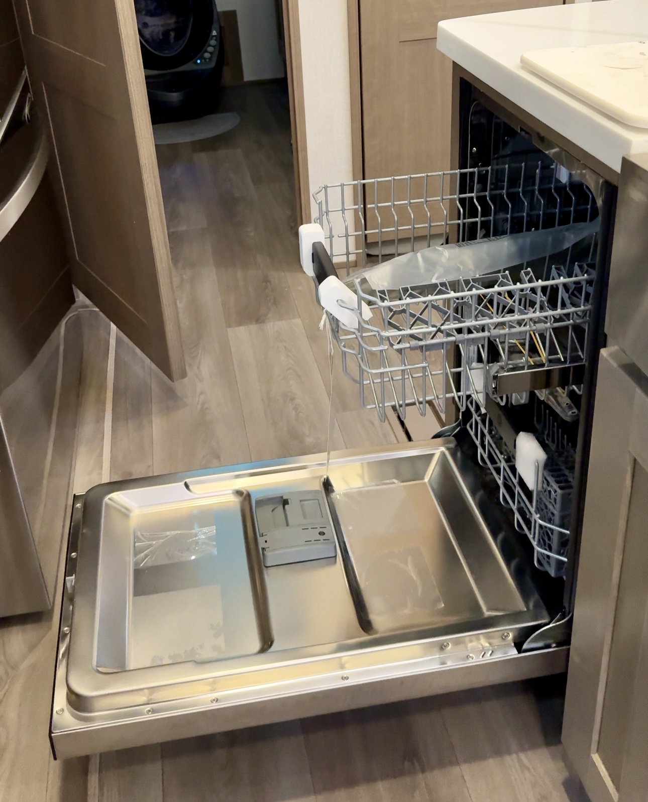 The dishwasher insideBailey and Nicole Damberg's KZ Durango Gold fifth wheel.
