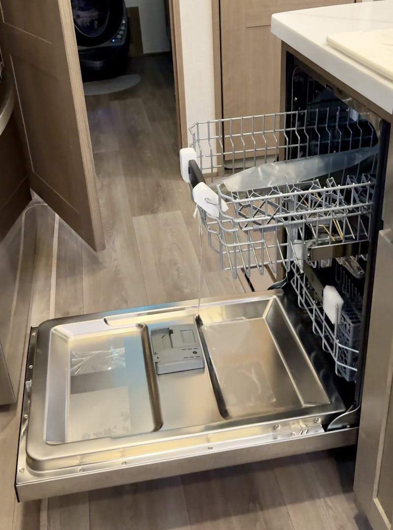 The dishwasher insideBailey and Nicole Damberg's KZ Durango Gold fifth wheel.
