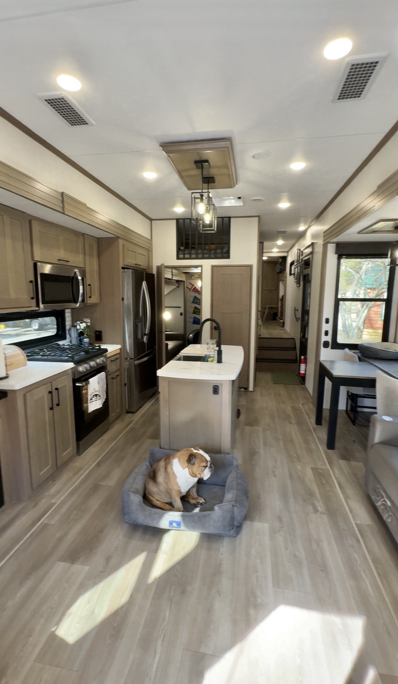 The kitchen and living area inside Bailey and Nicole Damberg's KZ Durango Gold fifth wheel.