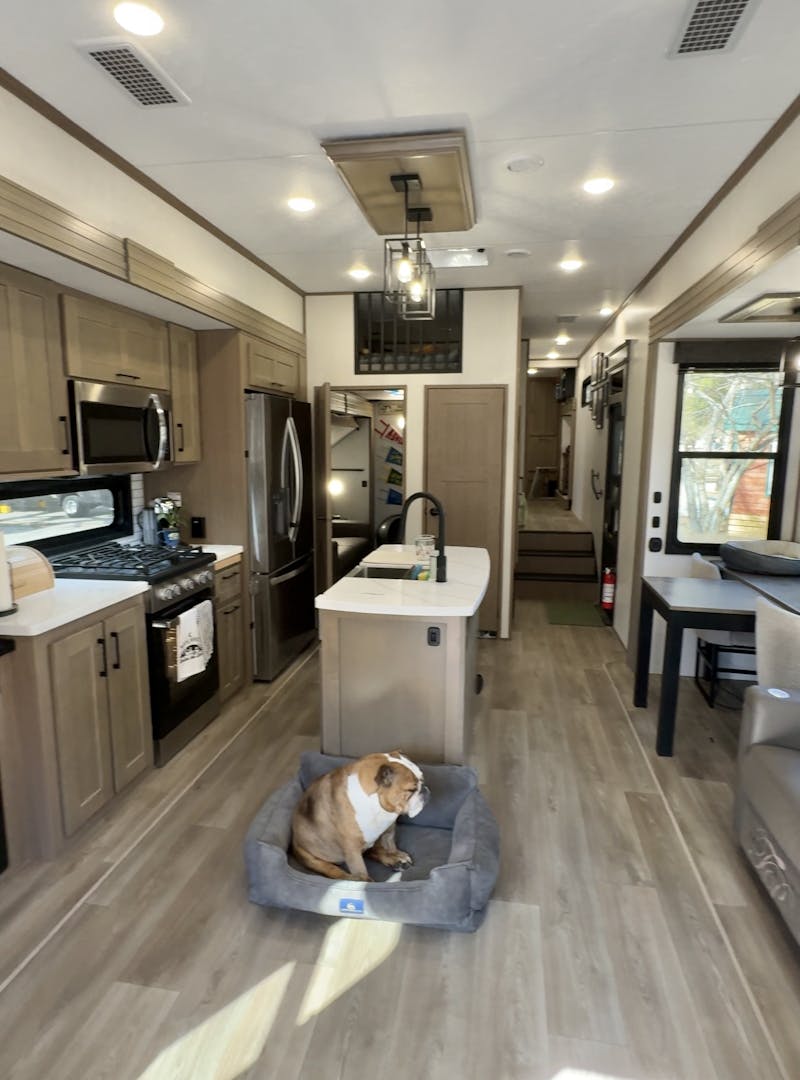 The kitchen and living area inside Bailey and Nicole Damberg's KZ Durango Gold fifth wheel.