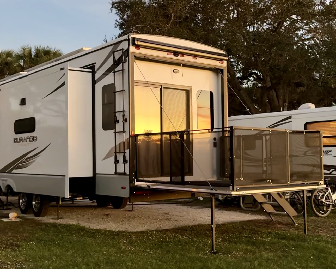 The patio on Bailey and Nicole Damberg's KZ Durango Gold fifth wheel at sunset.