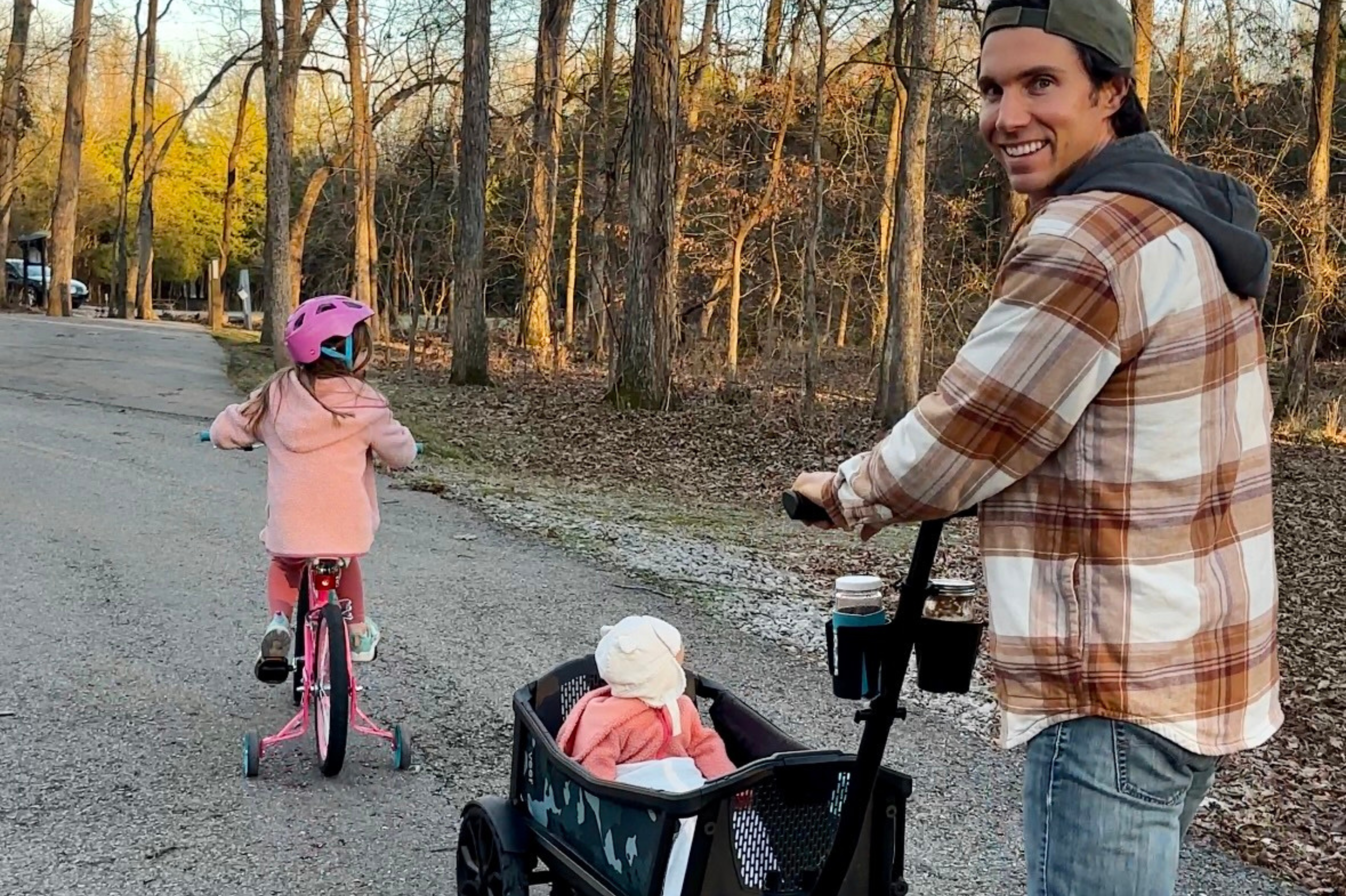 John King taking a walk with his daughters.