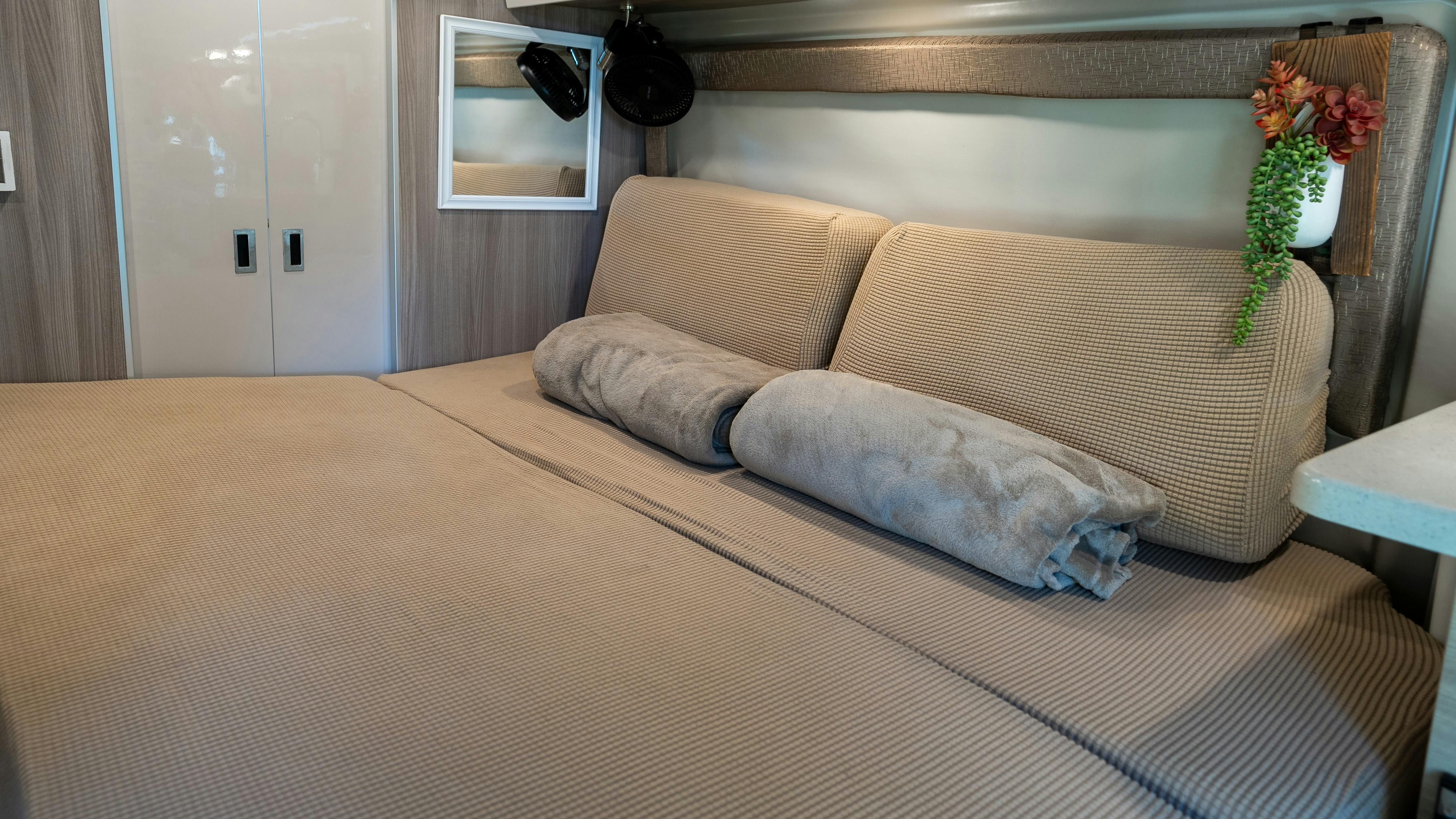 Gabe and Rocio Rivero's near-king conversion bed inside their Thor Motor Coach Sequence.