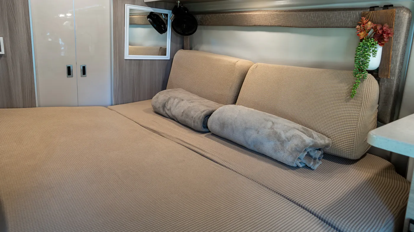 Gabe and Rocio Rivero's near-king conversion bed inside their Thor Motor Coach Sequence.